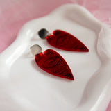 Red heart eye earrings