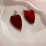Red heart eye earrings