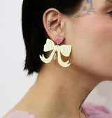 bow wow earrings yellow